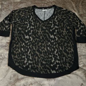 Maurices - dark leopard print, v-neck sweater. Rounded bottom. SZ XL